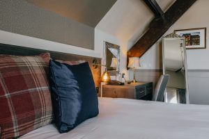 Bedroom with side table and mirror | Hotel in Barrow in Furness